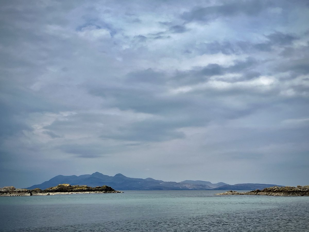 Isle of #Rum on a cloudy day from the rocky beach at Point of #Sleat #Skye.