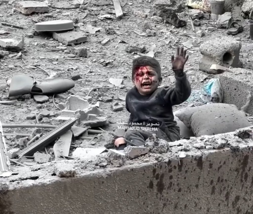 #GazaGenocide  #Gaza_children 
bomb explosion throw away the child to next building