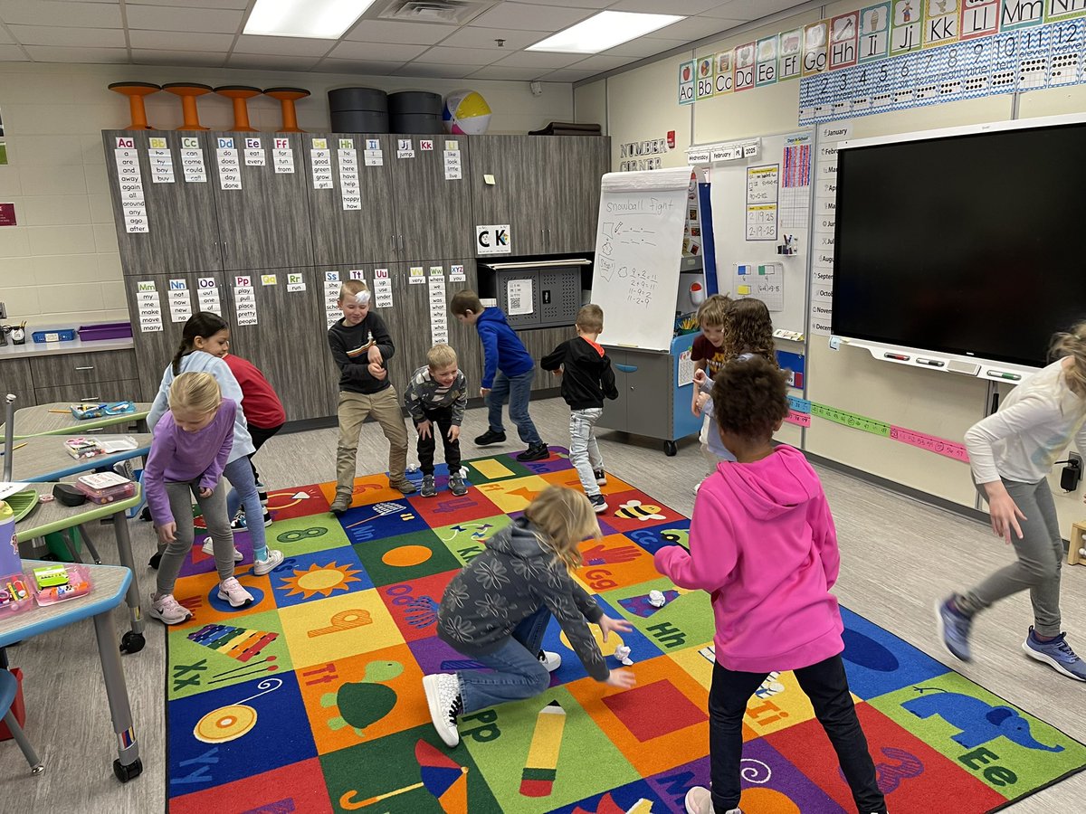 First graders doing the snowball fight strategy to practice addition strategies. #AVIDatMESI #theMESway