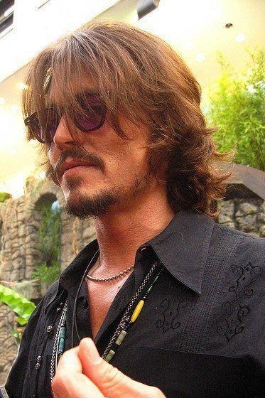 POV: You're looking up close at Johnny Depp in 2006