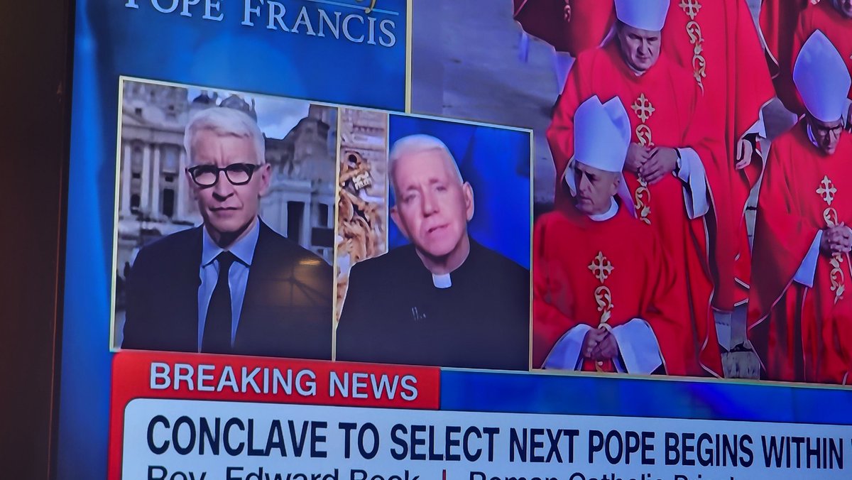 THIS PREIST LOOKS LIKE ANDERSON COOPER
