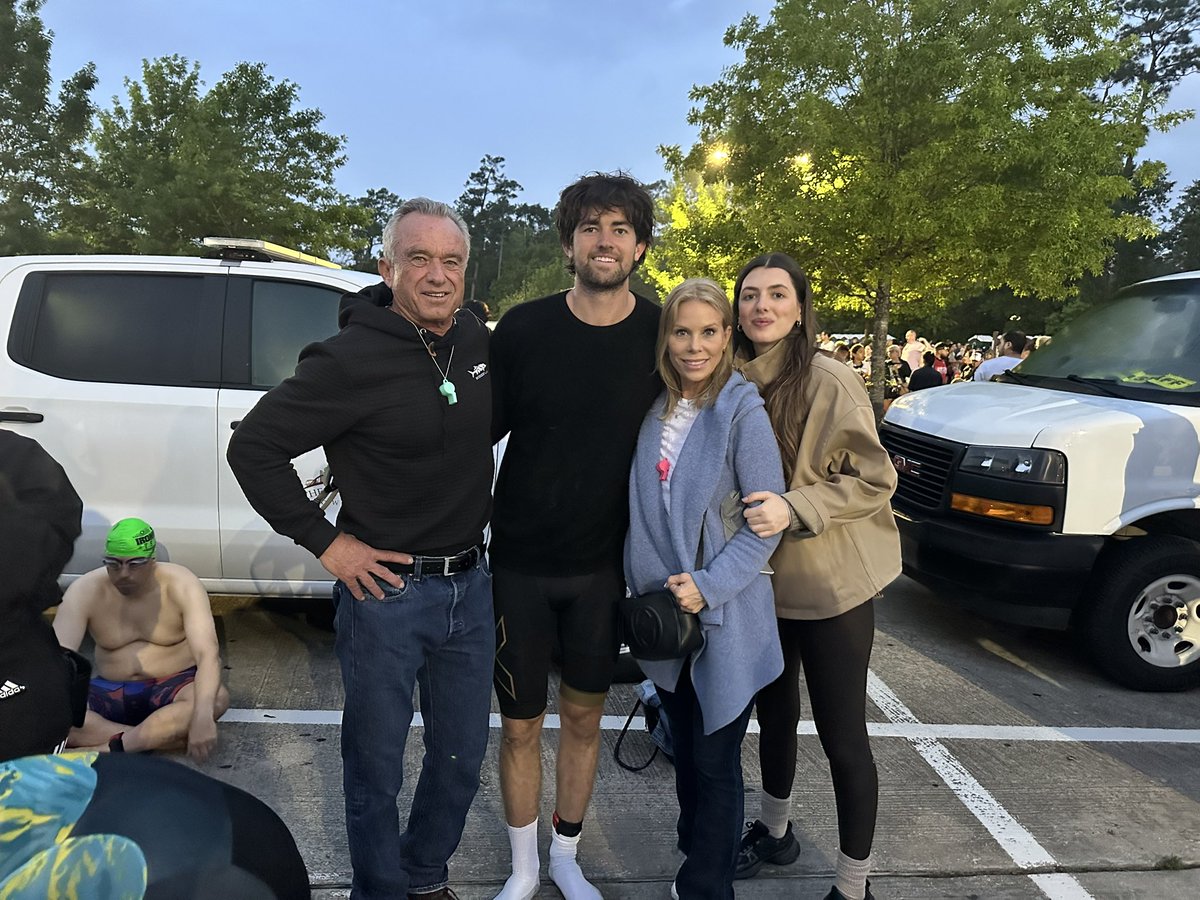 RobertKennedyJr's tweet image. At starting line with Cheryl, Kyra and Finn running his first Iron Man in The Woodlands, Texas.