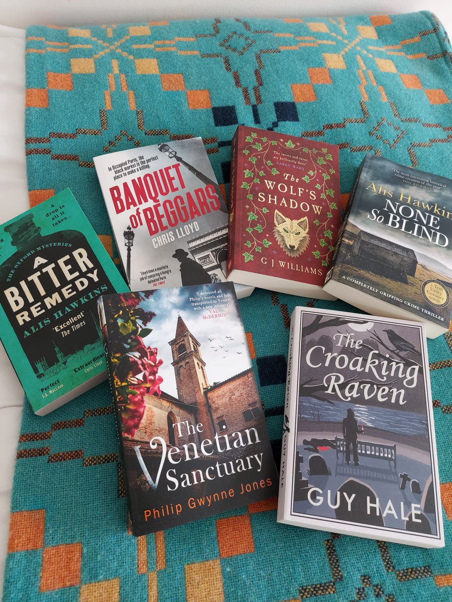 When at a crime writing festival books must be bought ... and somehow carried home on the train. Having a great time at Crime Cymru in Aberystwyth. Diolch!