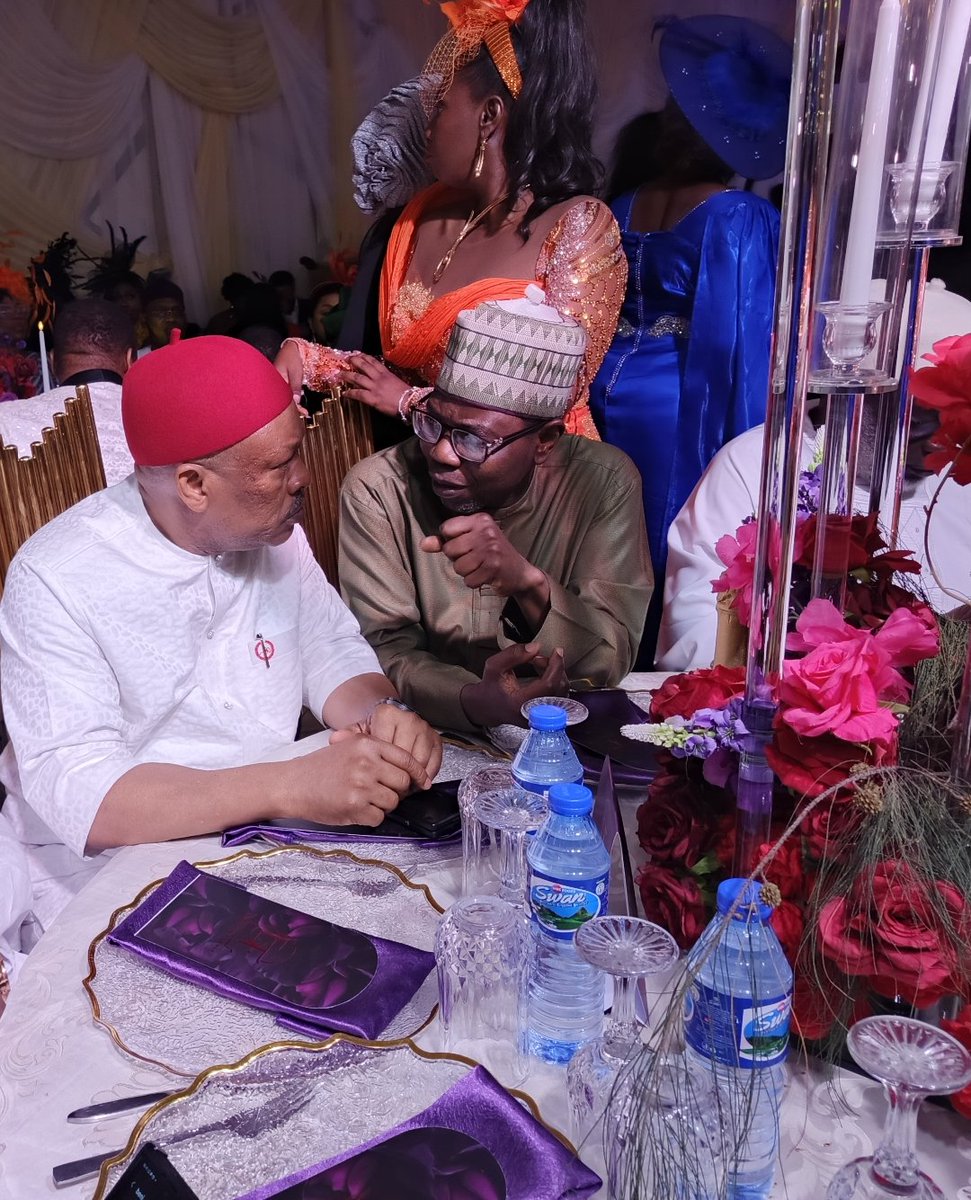 Discussing social and community matters with the National Secretary of the PDP, Sen. Sam Anyanwu, at the wedding reception of Ennena and Eghosa courtesy Sen. Uroghide in Abuja.