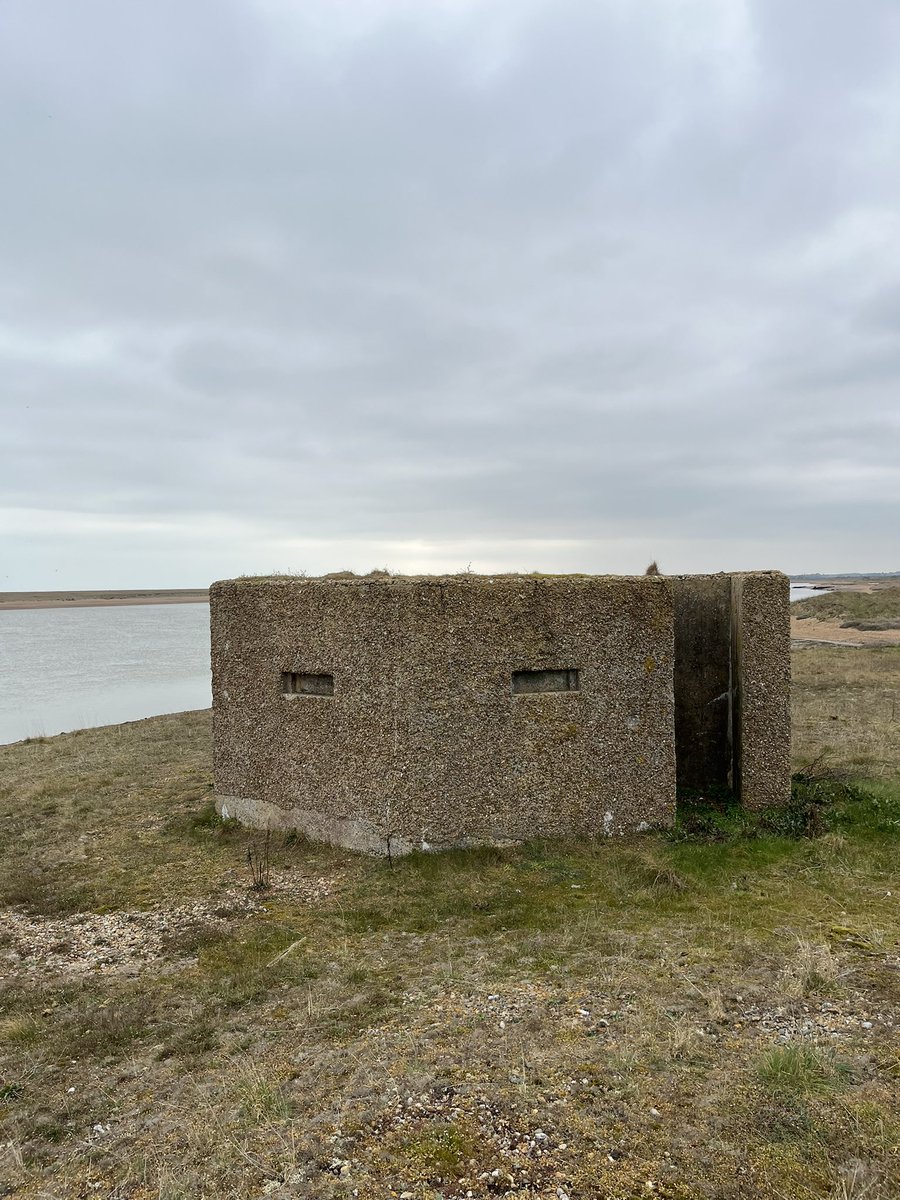 Gort_Line's tweet image. Two pillboxes on Simpsons Marsh, Hollesley, part of a FDL held by C Coy, 1st Liverpool Scottish, 55 Div in 1940. Part of the Orford defences. Classic platoon locality, with the 2 pillboxes forward and 1 supporting . Abandoned 1941 as part of the coastal defences reorganisation.