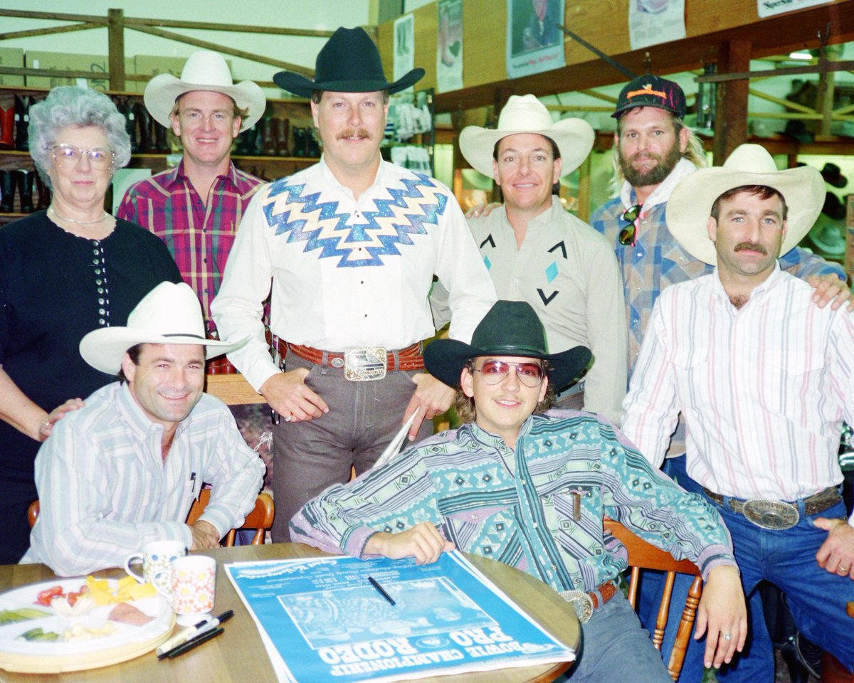 badcorodeo's tweet image. This autograph session in Bowie, TX was one of thousands held over the years.  Mack, #CharlieThrockmorton, #MilesHare, #jenningsrodeophotography, David &amp;amp; Phillip Fournier are picture with the store owners.  #BCRBackstage