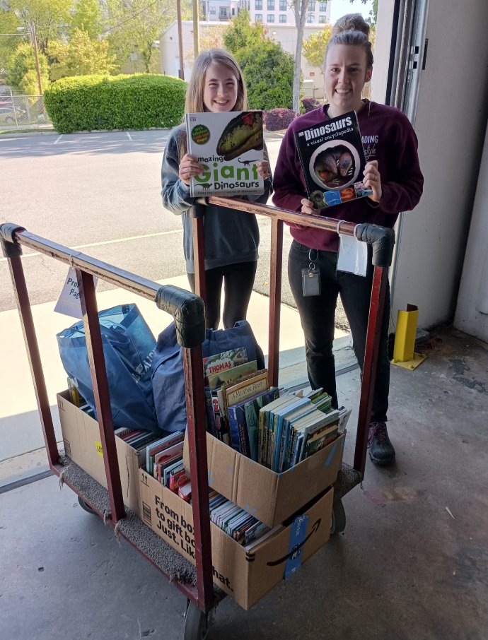 NCYOrchestra's tweet photo. NCYO families collected 295 books for @PromisingPages . NCYO knows that early access to books, much like early access to music education, is vital to a child's development which is why we're so thankful to all of our NCYO families for making this book drive a stunning success. https://t.co/QxUiJVAQxW