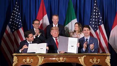 JerrySm10229162's tweet photo. @Muscle2018 @realDonaldTrump Matt says, "The elite passed Free trade deals like NAFTA." Here is a picture of Trump signing the NAFTA deal in 2018. https://t.co/zr5H3BxI0c