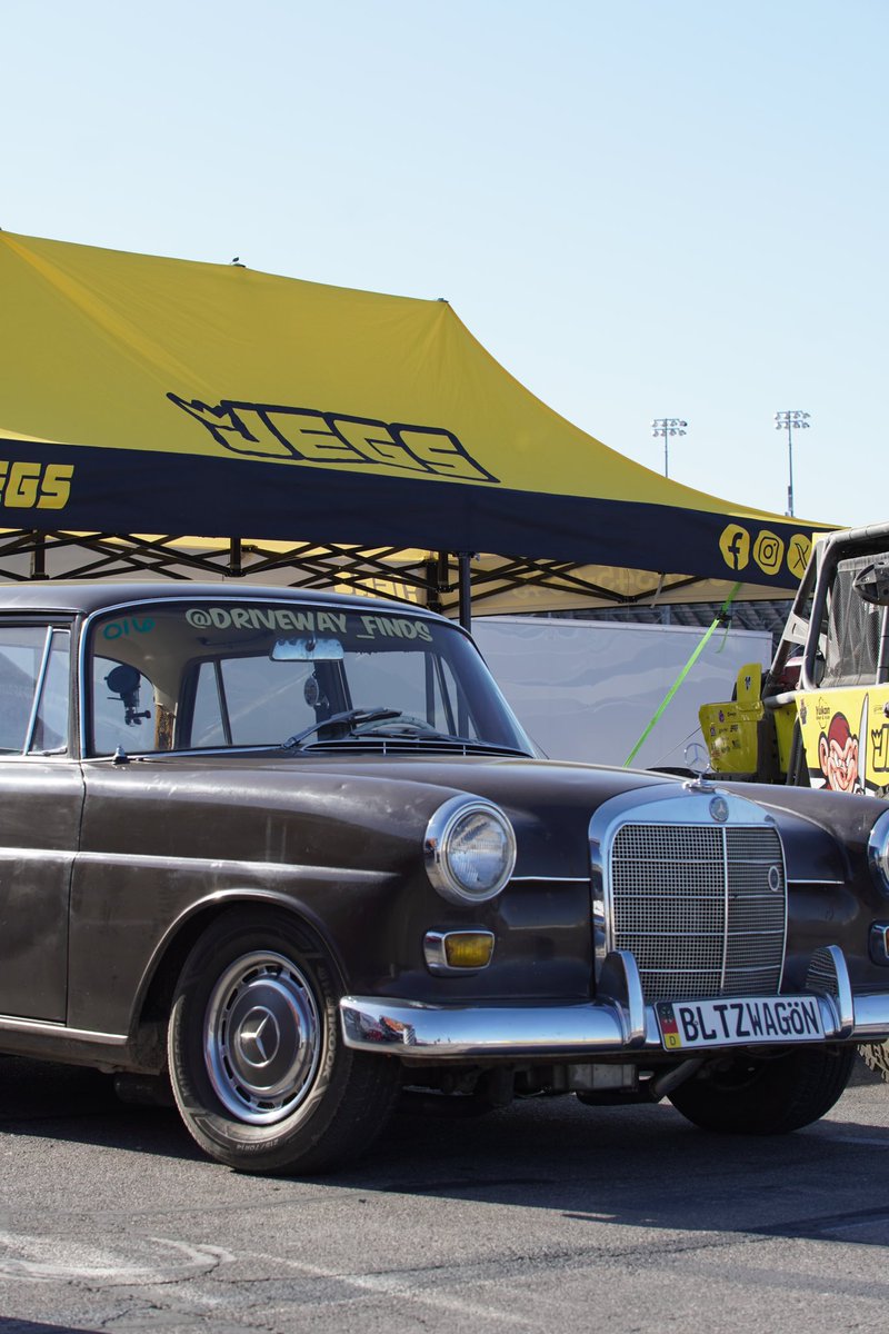 JEGSPerformance's tweet image. This may just be the LS Fest West JEGS Booth favorite… 😎 Driveway Finds LS-swapped this 1966 Mercedes-Benz 200D and we do have to say it’s pretty cool. 

This Benz is a W110 and originally had a 50hp diesel engine. John and Dustin picked the engine up off the ground at pick and