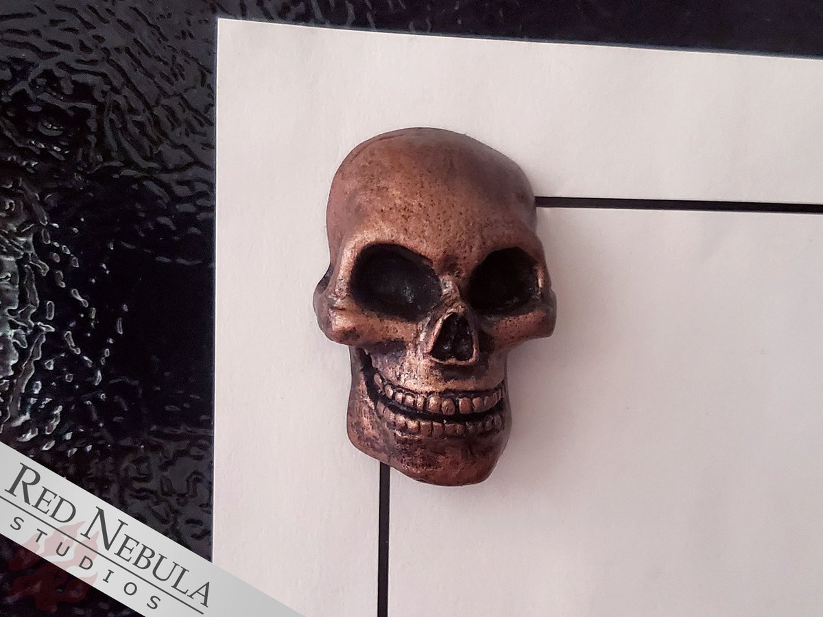 Little resin skulls. They make great magnets, ornaments, and costume décor.

I sculpted the original out of clay - that was fun! They're quite small and detailed.

#skulls #resinArt