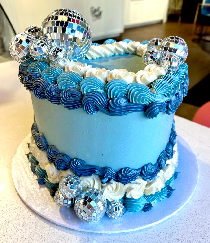 Have a ball with one of our custom cakes!  🪩💙

May and June are the busiest time of the year for special events and custom cakes! We will always do our best to accommodate last minute custom requests, but it’s best to get your orders in AT LEAST two weeks in advance!