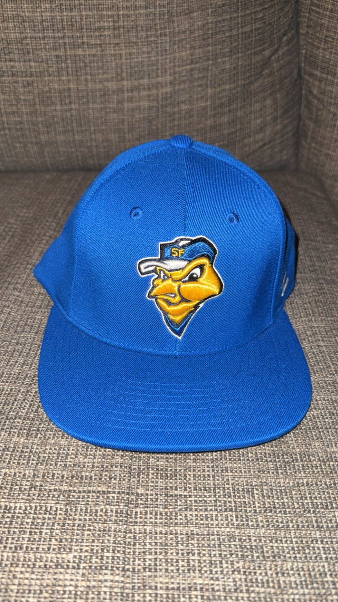 The hats we wore during our recording with <a href="/ScotGladstone/">Scot Gladstone</a> of the <a href="/GoRangeRiders/">Glacier Range Riders</a>. Scot wore his RR Range Riders hat with an arrowhead and ‘22 on the back. Johnny wore his <a href="/calhouncityhs/">Calhoun City HS</a> Wildcats hat. Eric wore his <a href="/canaries/">Sioux Falls Canaries</a> hat.