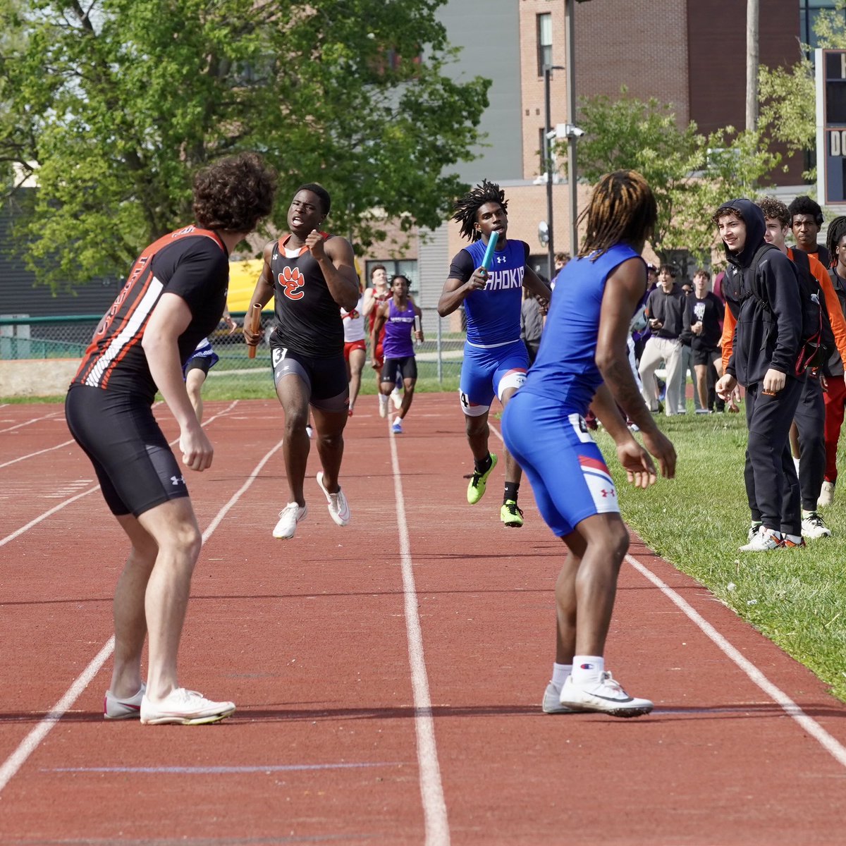 A photo I’ve been trying to capture, but for different reasons I’ve missed it. This is close to what I want. A relay. Teammates approaching and ready to hand off. I like the balance with others in the back. 4x400 Winston Brown Invite. April 26.