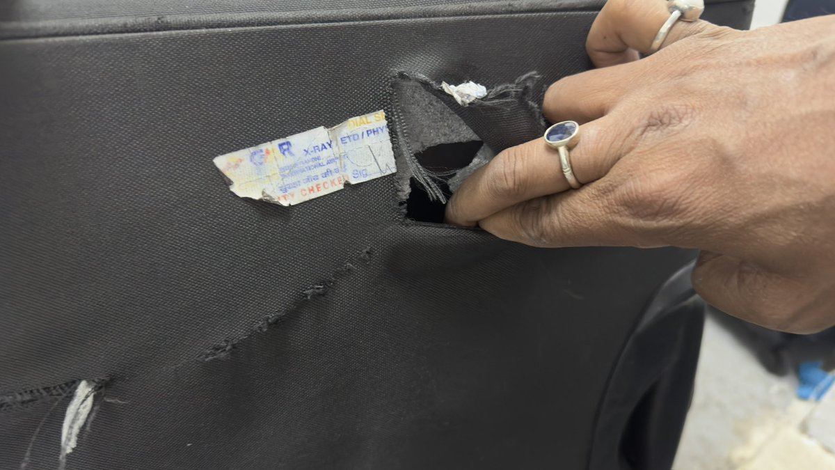 pawan_007singh's tweet photo. @airindia @airindia I have already mentioned in my previous tweet that I have waited for almost 2 hours to complaint at baggage services. I am attaching you the complain copy FYI. Also the photo of damaged bag and missing stroller. https://t.co/6q8Rvs6qUU