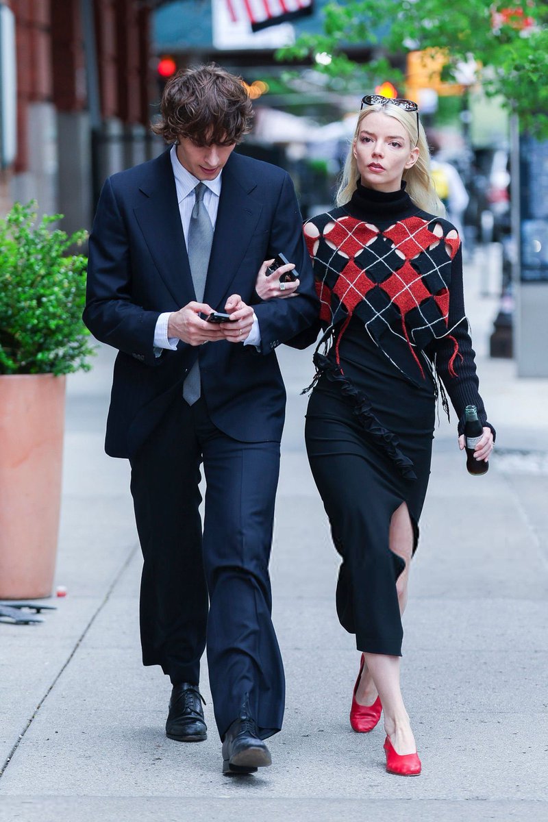 saintdutchess's tweet photo. I’ve never seen Anya-Taylor Joy’s husband without a trench coat over a bomber jacket or a suit and tie. He’s committed. https://t.co/6On0aUhvWk