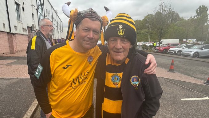 Harry Bradley and John Conway, dressed in Largs attire - including a Viking hat for Harry - for the final.