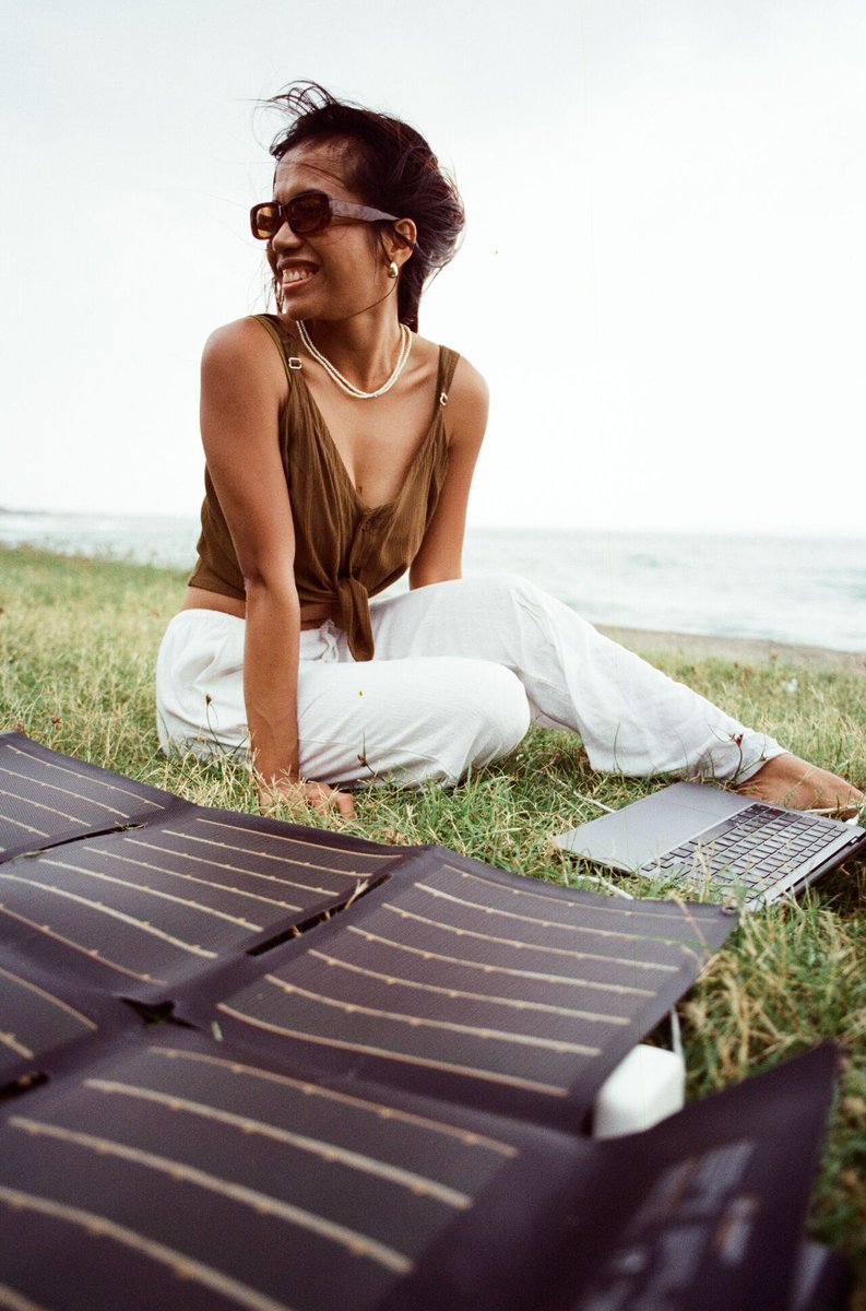On the beach with Satoshi Solar panels