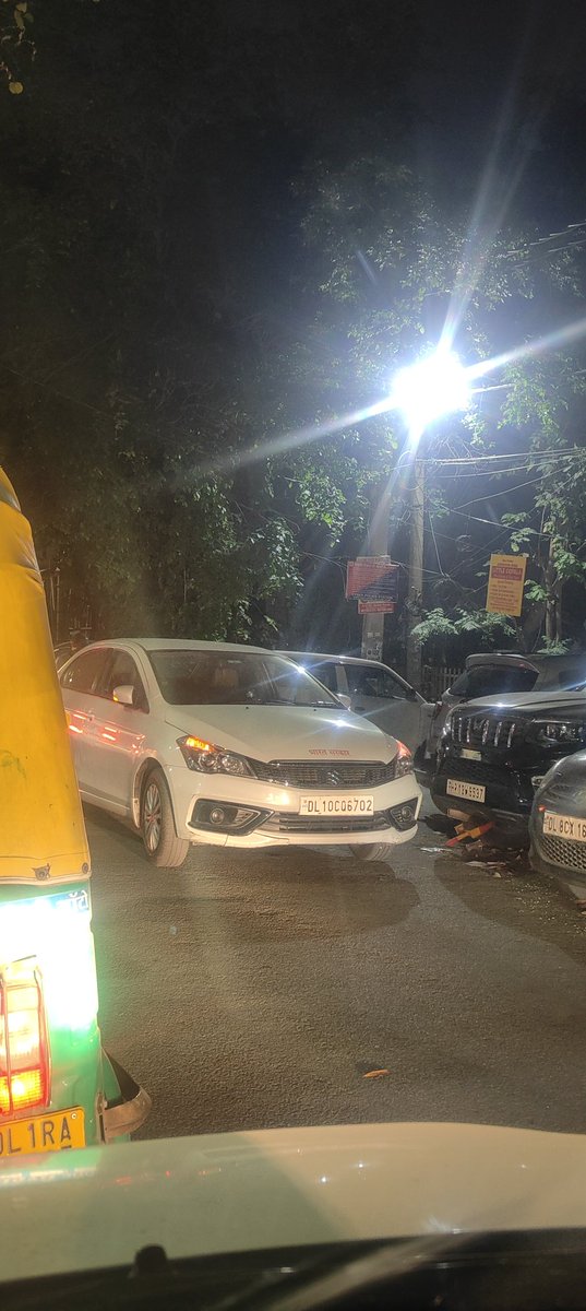 Hi <a href="/dtptraffic/">Delhi Traffic Police</a> a car parked at Keshav Puram on C-7 main road, it has a sticker of Government of India and car is parked in the middle of the street, resulting jam and inconvenience. I thought it to be a car breakdown issue but crowd it saying it was like that yesterday as well.