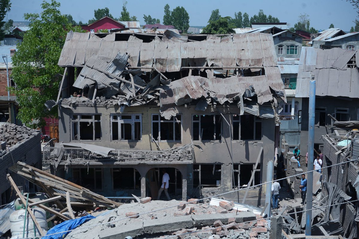 Kashmiri villager look at the remains of militant Ahsan Ul Haq Sheikh’s house, demolished by security forces in Murran, Pulwama. Sheikh was accused of involvement in the deadly tourist attack in Pahalgam.

Photos:- <a href="/Sameerhussain95/">Sameer Hussain</a>