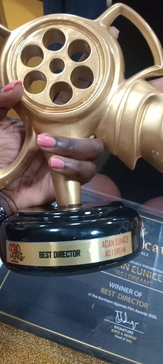 From dreaming in silence to standing on the big stage.  Today, I won Best Director at the Northern Uganda Film Awards!
This award is a reminder that we should never stop believing in our dreams. 
Thank you, <a href="/NUFA_OFFICIAL1/">Northern Uganda Film Makers Association (NUFA)</a>.

<a href="/UCC_Official/">UCC</a>
<a href="/BettyAmongiMP/">Hon Betty Amongi</a> <a href="/UCC_ED/">Hon. Nyombi Thembo</a>