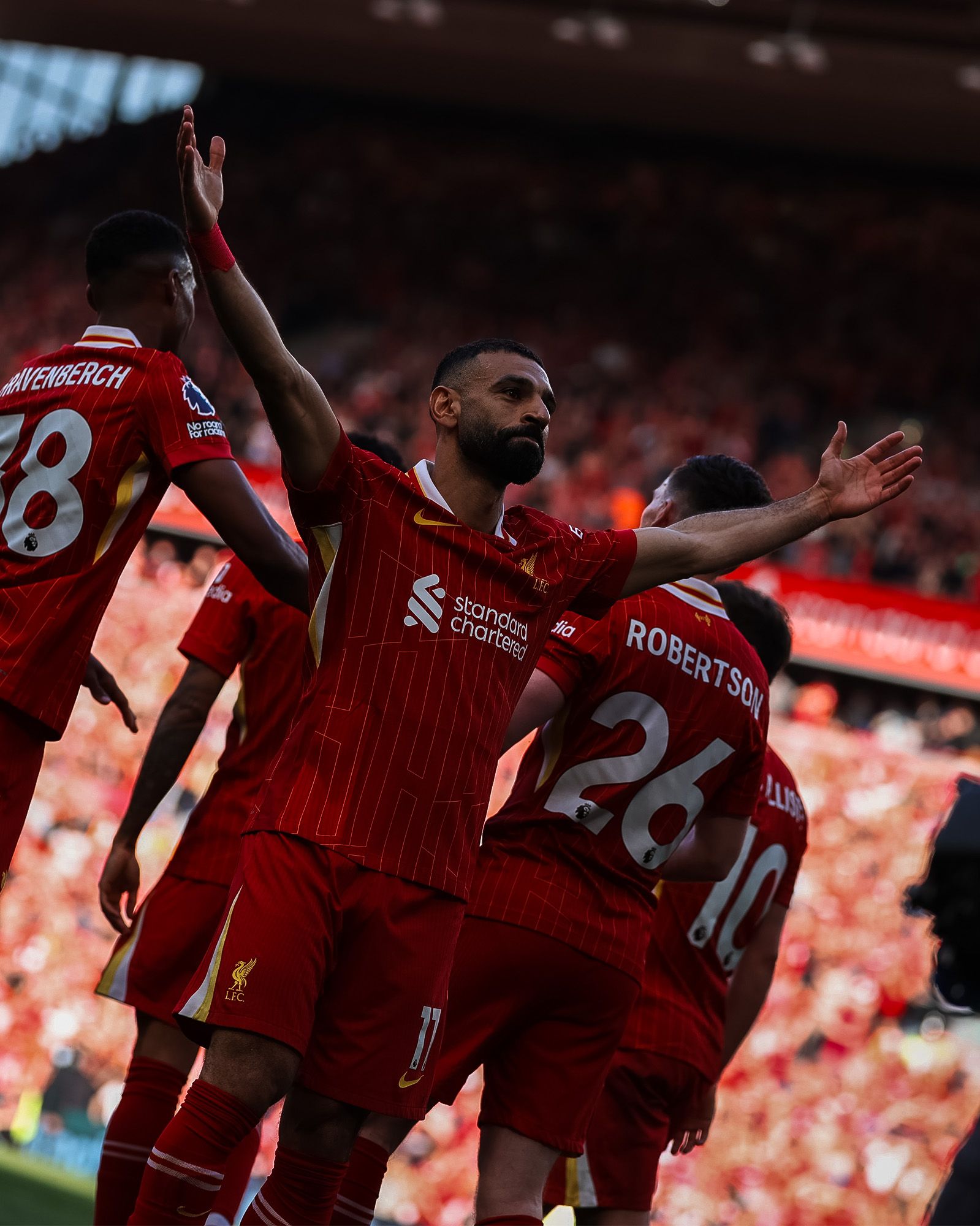 Photography of Mo Salah celebrating his goal against Tottenham.