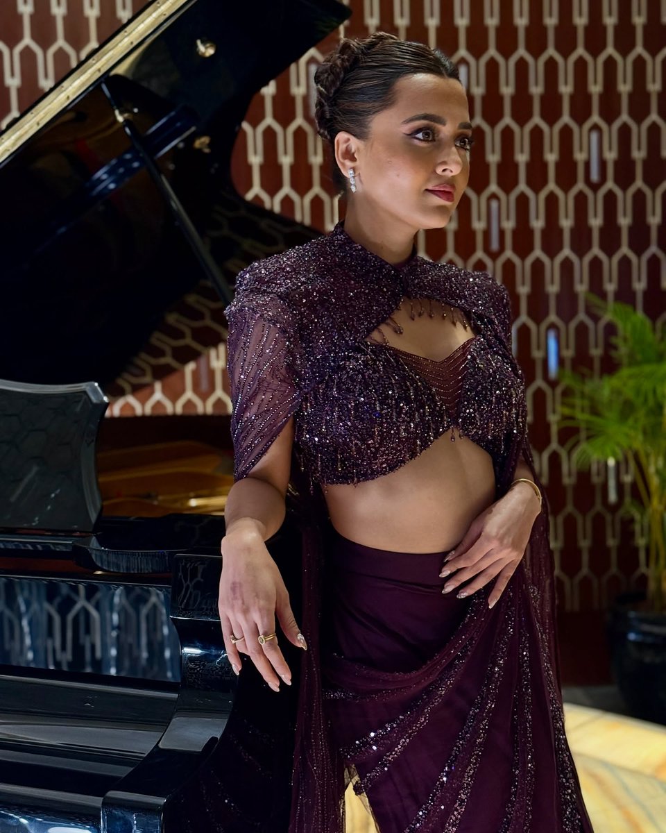 Glamorous look! #TejasswiPrakash dazzles in a stunning black shimmery dress🖤✨