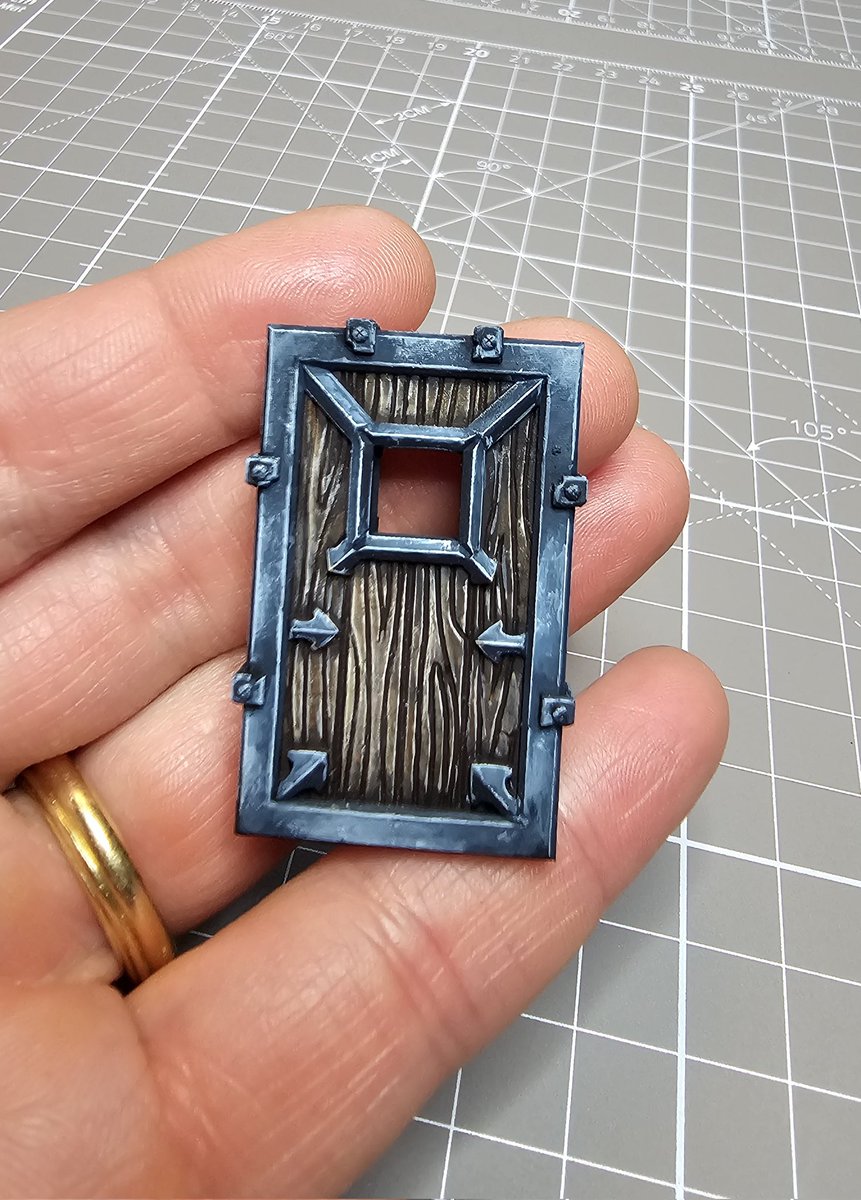 Painted a shield but it looks like door 😂 there's a handle stand thing behind haha