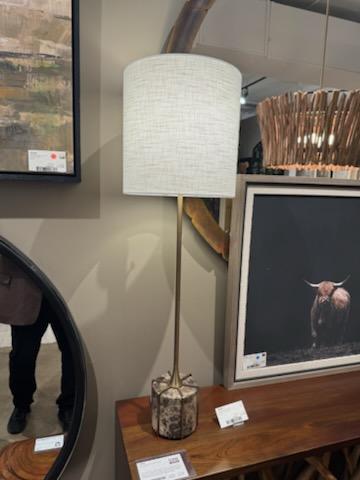 Make the #uttermost showroom your next stop today <a href="/HPMarketNews/">High Point Market</a> to see this new #carolynkinder design. The Britwell Buffet Lamp showcases a sleek Emperador Dark Brown marble foot separated by plated brass details and matching fluted base. uttermost.com/britwell-buffe…