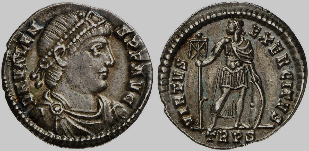 A Valens Miliarensis is a silver coin minted during the reign of Roman Emperor Valens (364-378 AD). It's  a type of silver coin that was common during the late Roman period, and  they were often used in hoards like the Thruxton Hoard. Valens  Miliarensis coins are often