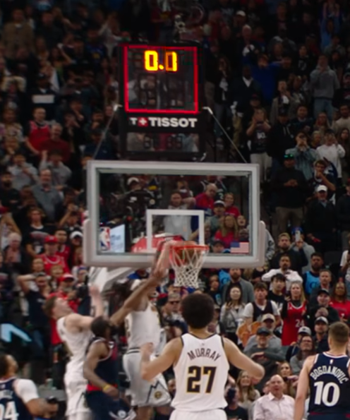 DTLund's tweet photo. @SportsCenter Finger still touching, but the ball is mostly through the rim. What's the rule here? https://t.co/Vh4TMW8SJ7