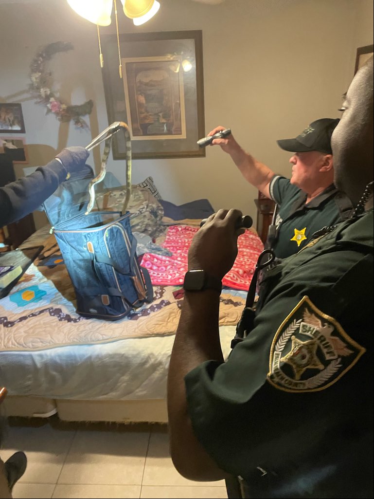 PBCountySheriff's tweet photo. When you’re looking for a sweater and end up finding a snake instead! 😳 🐍

We responded to Kings Point after an elderly resident opened her closet and found a very unwanted guest: a Ball Python. The snake threw a little hissy fit, but was safely taken into custody (no handcuffs needed). Great job to Deputy Vislocky and all the units who helped this resident remove this snake from her house.