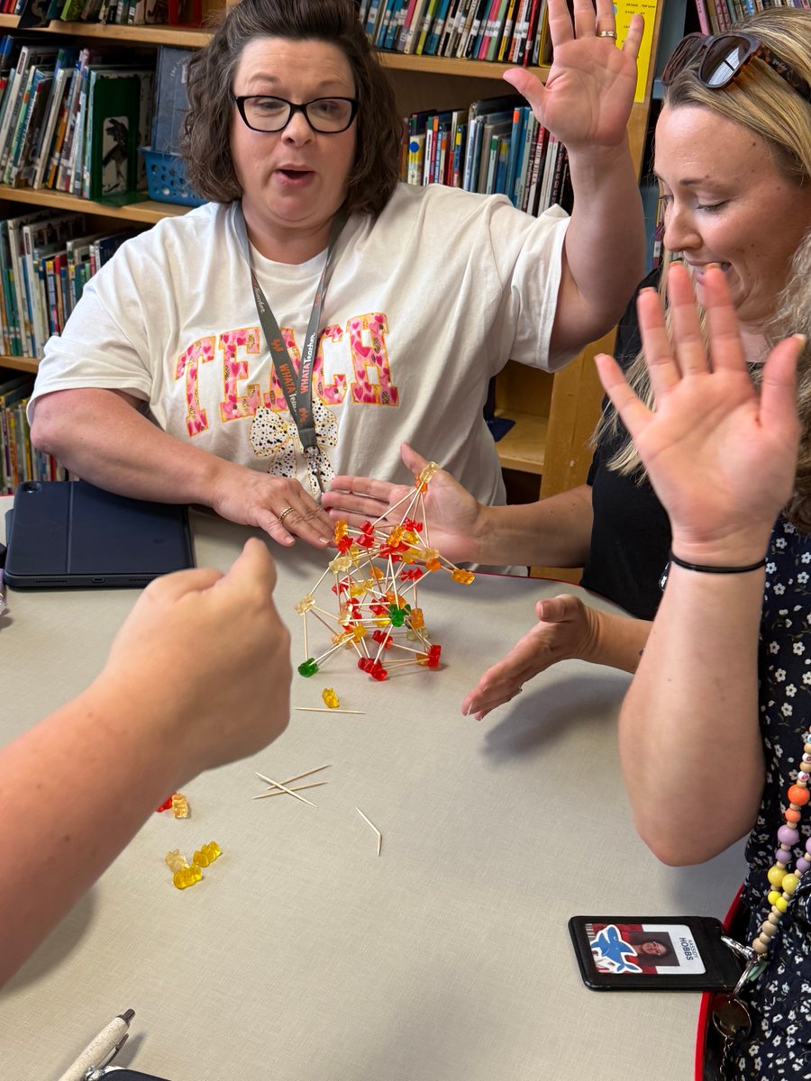 In honor of National Gummy Bear Day, teachers stepped up to the challenge of building the tallest tower in 5 minutes using only gummy bears and toothpicks! #speegleville #midwayisd #beststaffmeetingever