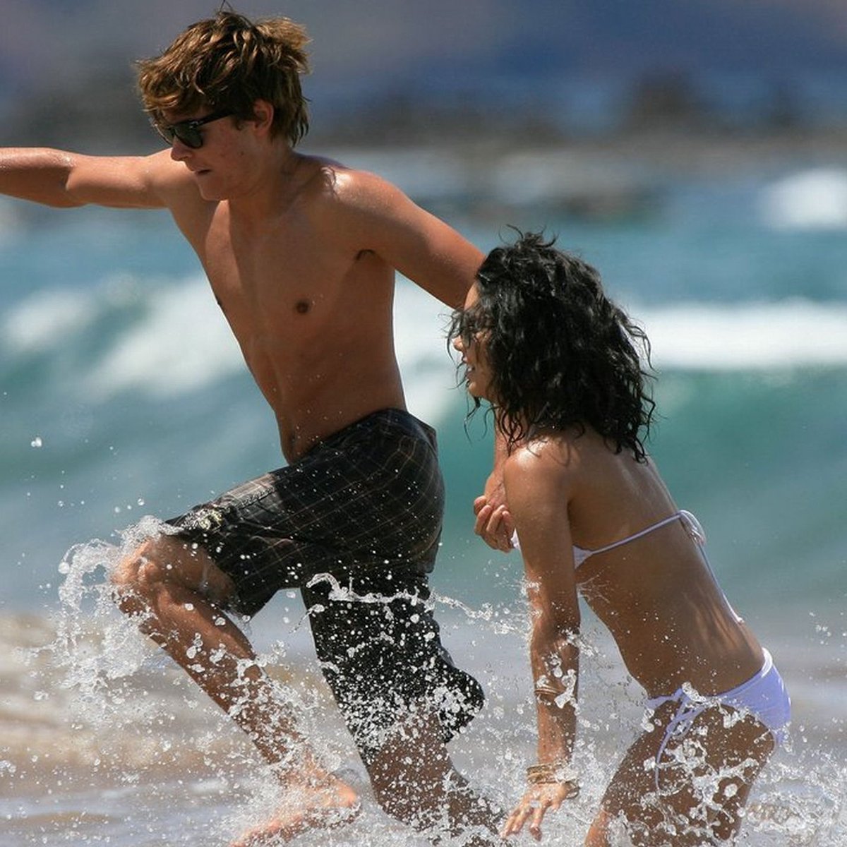 May 1, 2007: Vanessa Hudgens and Zac Efron at the beach in Hawaii., image size:1200x1200