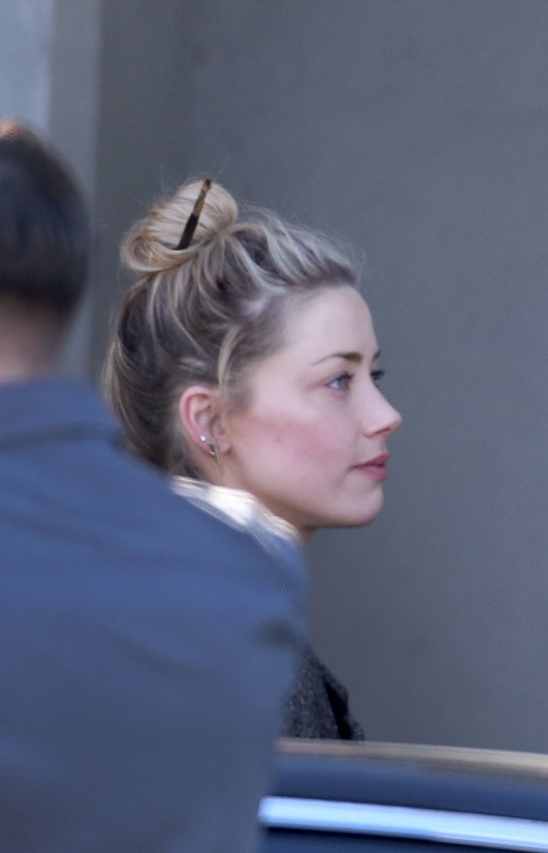 love the paint brush in her hair.