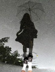 Dancing through the raindrops like no one's watching! 💃