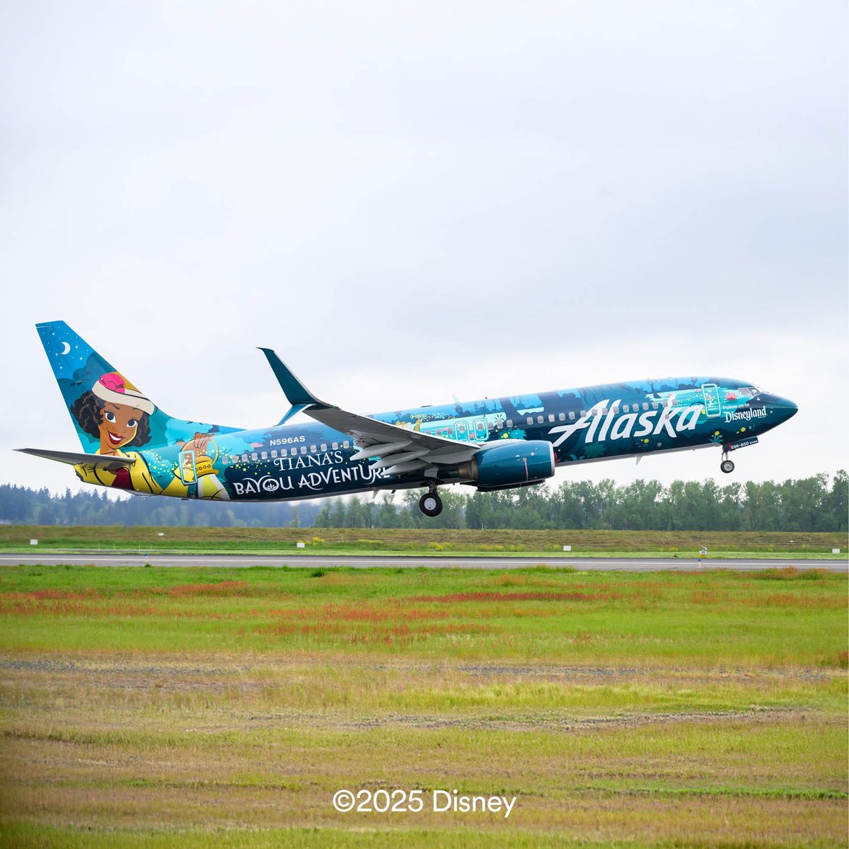 Now boarding for the bayou. This weekend, we unveiled our 9th specially-themed @disneyland aircraft, Tiana’s Bayou Adventure Flyer, with a joyful Mardi Gras-themed celebration at PDX. 
We’re honoring Princess Tiana’s bold spirit of adventure—so tell us, where are you headed on