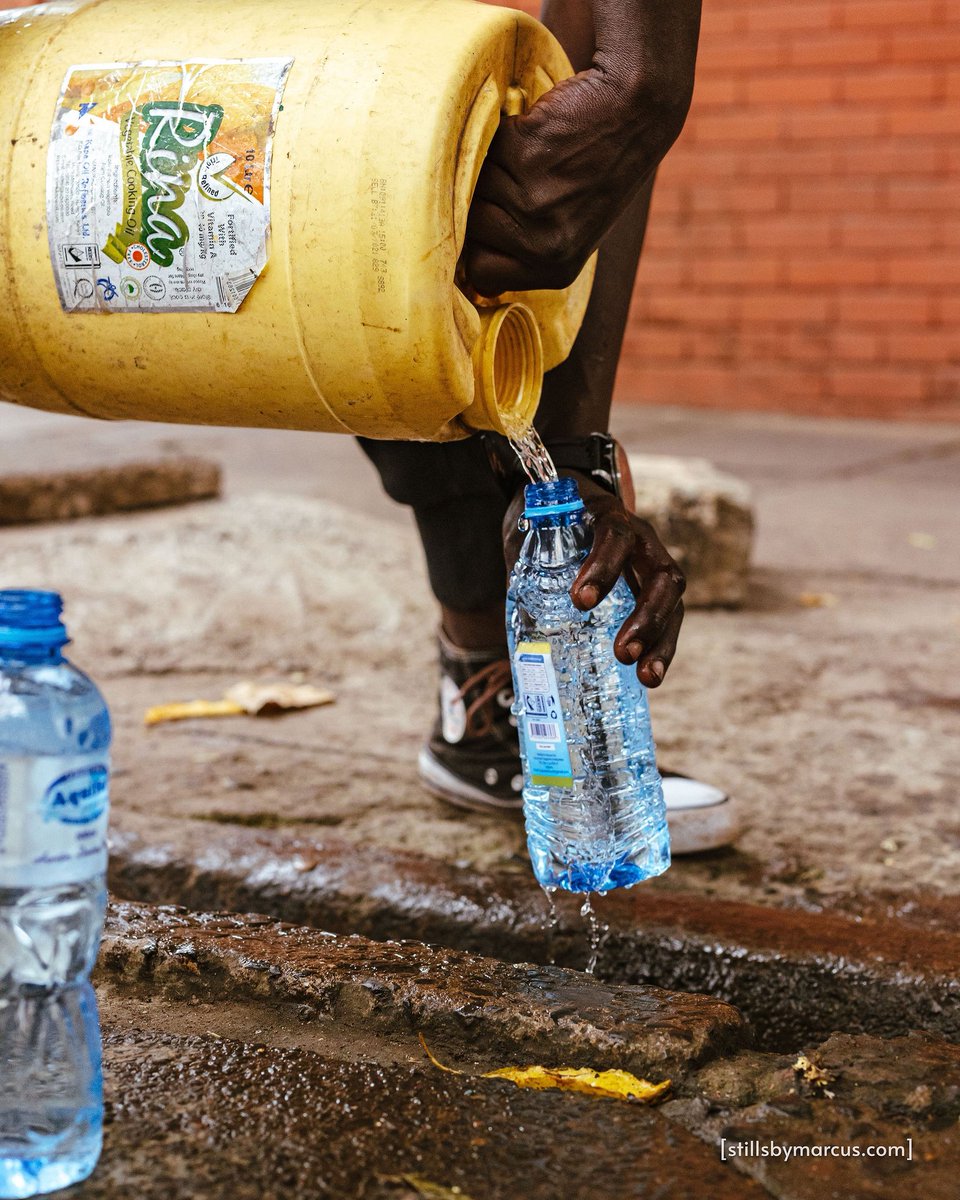 I saw, in this moment, someone emerging through a plume of teargas - a Moses figure parting a sea of poison gas - with jerrycans of water, handing them over, as an entire distribution line organically formed: One person collecting empty plastic bottles, another filling them up...