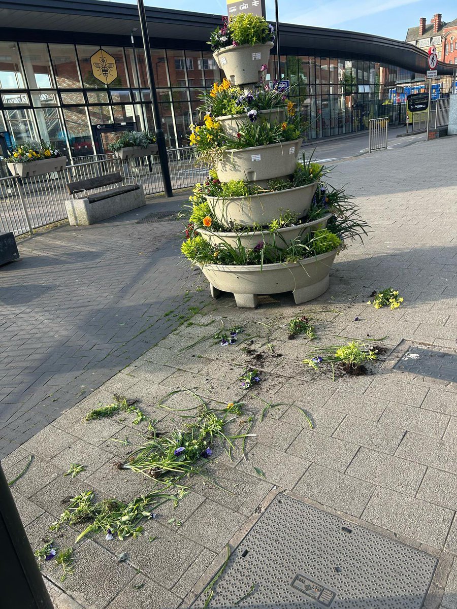 2nd time in a week! Our planters vandalized beyond repair again by gangs of balaclava-clad youths. Spitting &amp; throwing things off nearby roof at people and destroying whatever they can get their hands on. Many already excluded from area but zero intervention from <a href="/GMPTrafford/">Trafford Police (GMP)</a> 😡