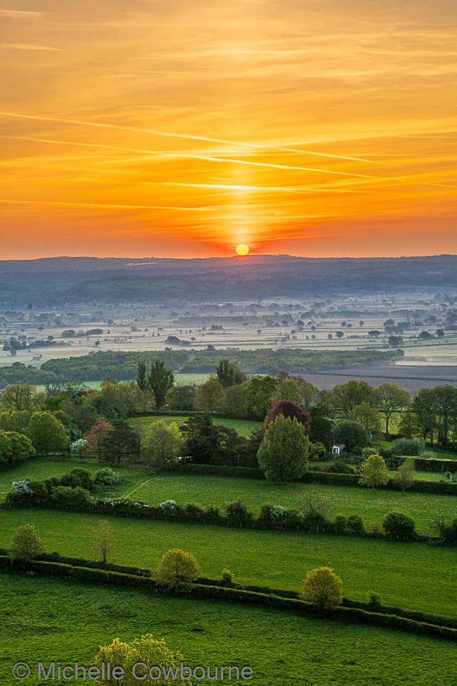 Liquid gold sunrise. Taken this morning looking down from Glastonbury Tor.