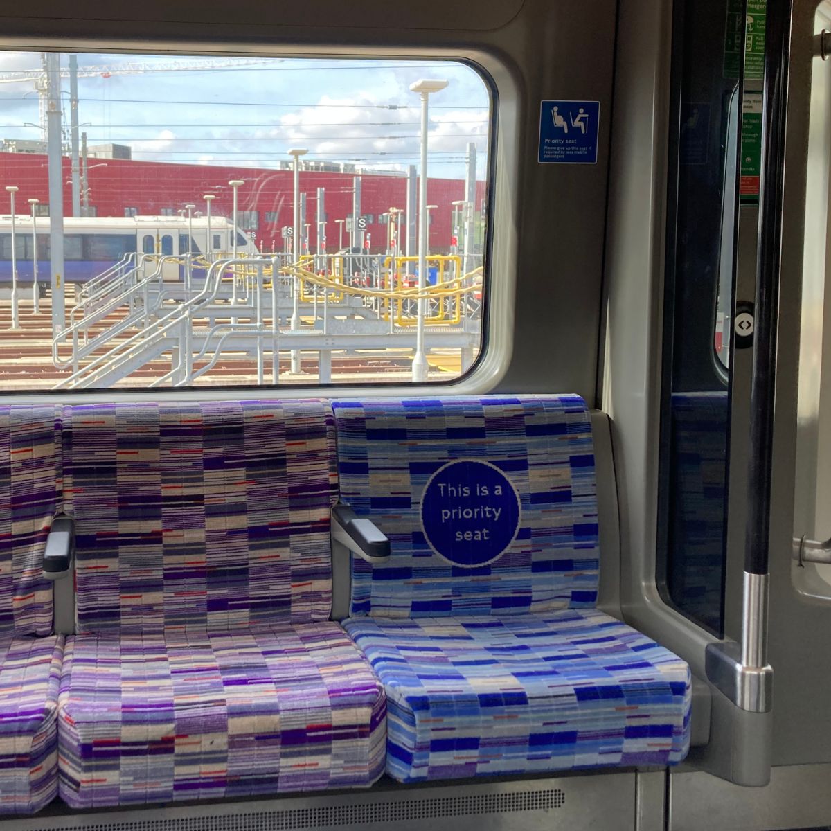 TfL's tweet photo. This #PrioritySeatingWeek, we’ve launched new priority seating on our Elizabeth line trains 💺 💜
The new priority seat badge and moquette colours will improve the visibility of priority seating so customers can feel more empowered when travelling on our network.
Have you spotted this upgrade on our network yet?
#accessibility #priorityseating