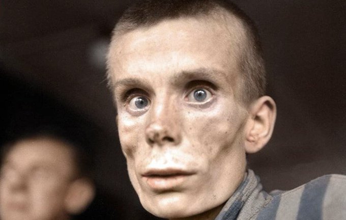 The haunting look of an emaciated 18-year-old Russian girl after being liberated from Dachau, #OTD April 29, 1945.