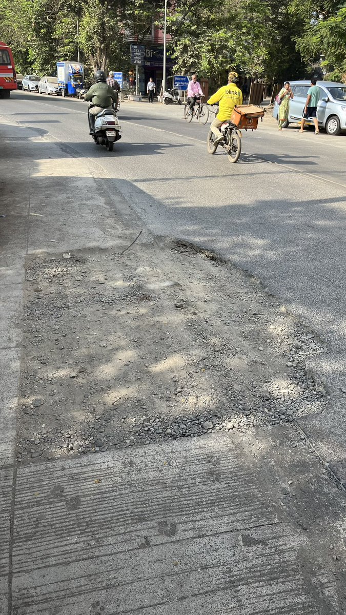 macwan_ankit's tweet photo. @mybmcWardPN @CMOMaharashtra @mieknathshinde @AslamShaikh_MLA @Yogeshsagar09 @mybmc newly concretised rd dug up and left unattended. This is likely to cave in during monsoon. It’s a safety issue as it is next to school. Sevantilal khanwanwala rd,opp SBI BANK,Jankalyan ngr Malad W https://t.co/GNmgAGpZ0x