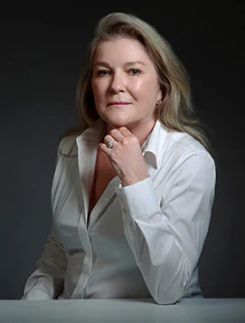 A professional headshot of Kate Mulgrew