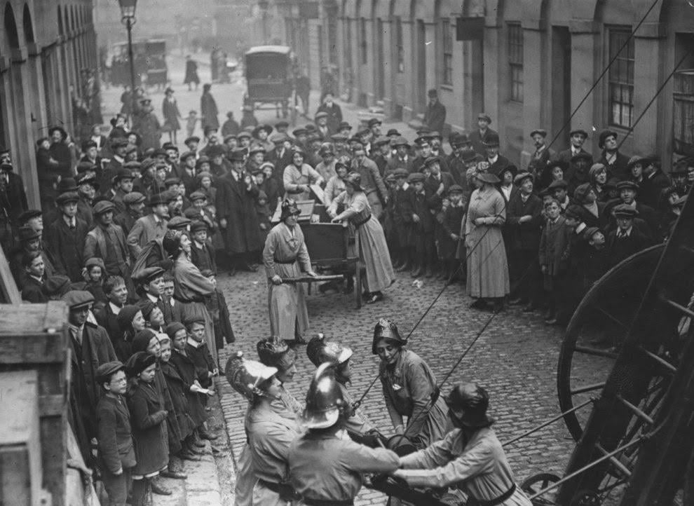 vintagestuff4's tweet image. UK womens firefighter brigade in a fire drill
1916