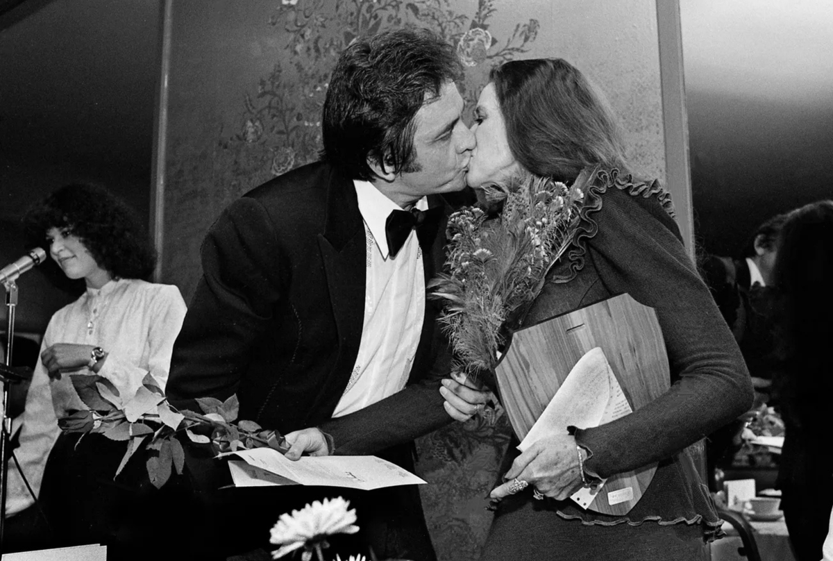 Johnny Cash proudly stands with June as she receives the Nashville Community Service Award on  April 29, 1980.

Photo Source: The Tennessean