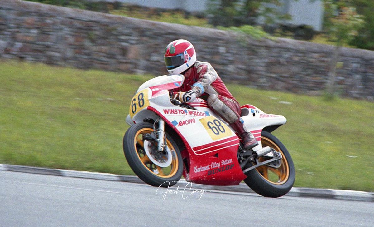 J C (@arai45) on Twitter photo Two Stroke Tuesday with the legendary Paul Cranston. Paul won the 500 Ulster Grand Prix in 1982, and is still racing today. This photo on the <a href="/McAdoo/">Jeff McAdoo</a> Racing RG500 was taken at Sulby Bridge, but I never tagged the negative strips at the time so I think it’s 1986 or ‘87. #legend Two Stroke Tuesday with the legendary Paul Cranston. Paul won the 500 Ulster Grand Prix in 1982, and is still racing today. This photo on the <a href="/McAdoo/">Jeff McAdoo</a> Racing RG500 was taken at Sulby Bridge, but I never tagged the negative strips at the time so I think it’s 1986 or ‘87. #legend