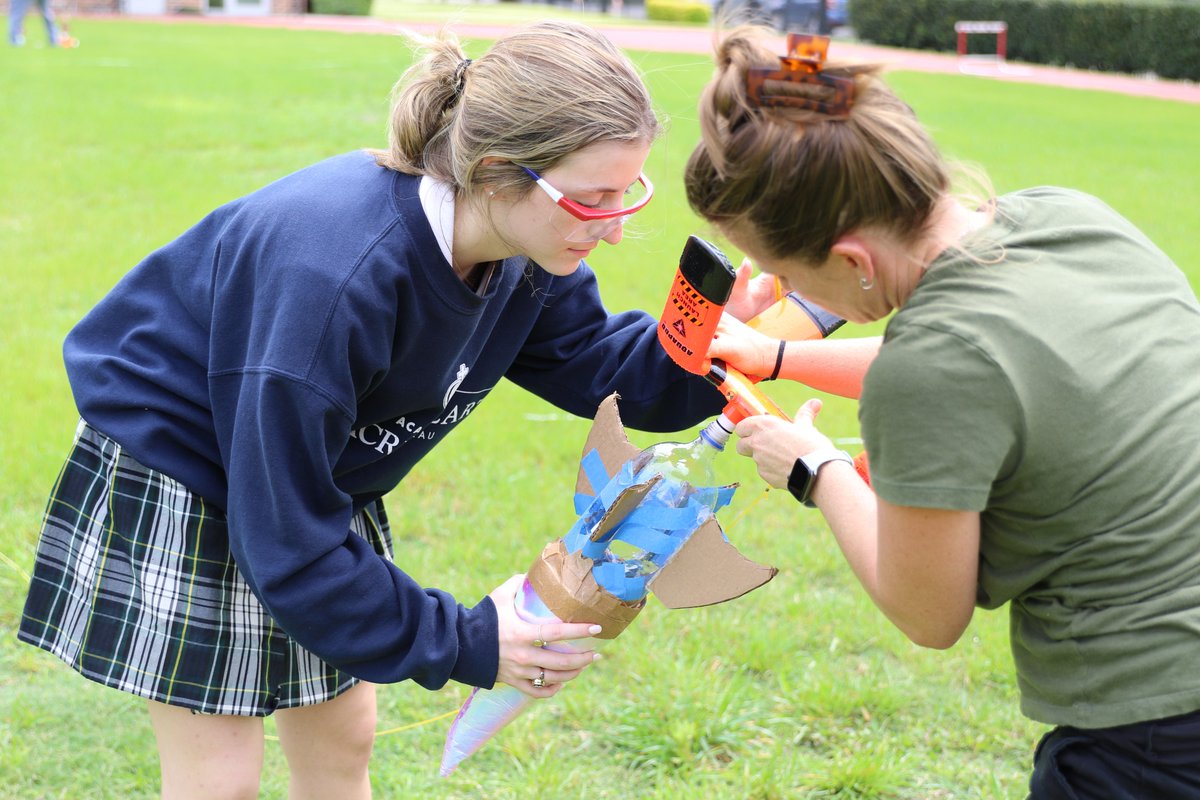 It is Rocket Science at Sacred Heart! Recently, Honors Physics students put their dynamic engineering and physics skills to the test by first launching an empty 2-liter bottle. From there, students worked to understand the conceptual underpinnings of motion, interactions, and