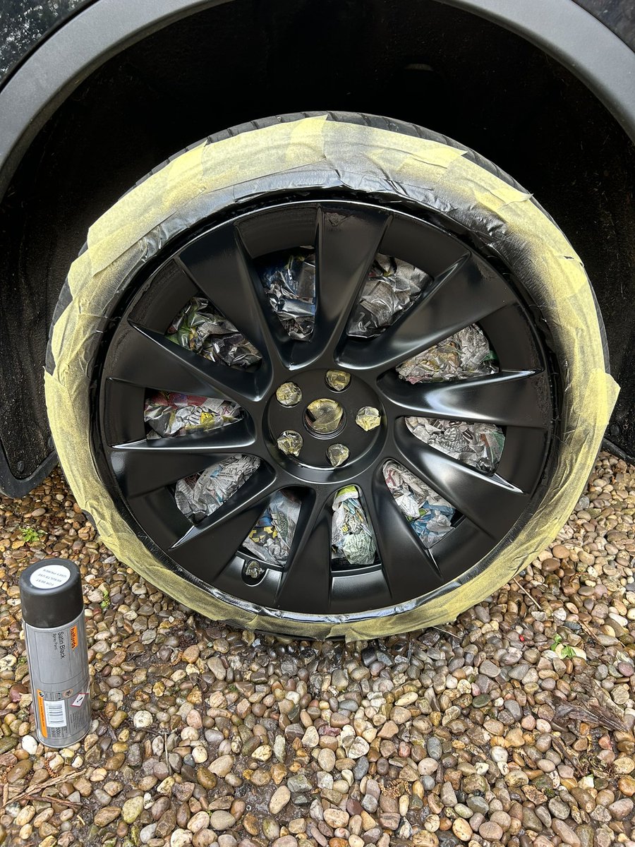 Refresh your scuffed Tesla alloy for less than a tenner. A can of <a href="/Halfords_uk/">Halfords</a> satin black aerosol and a roll of @3m masking tape. Easy.