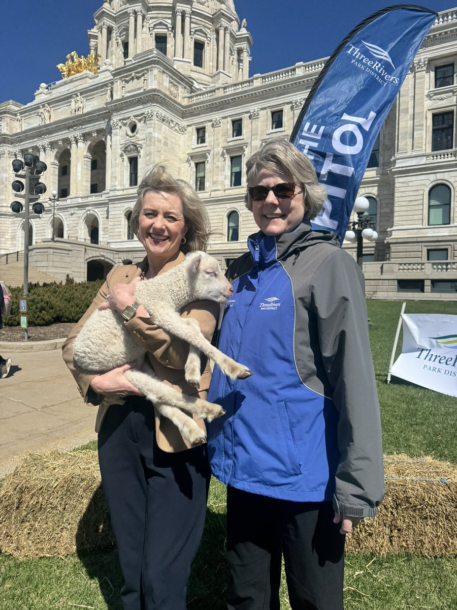 threeriverspark's tweet image. Representative @KRobbinsMN and Three Rivers Commissioner Marge Beard spend some quality time with a little lamb.