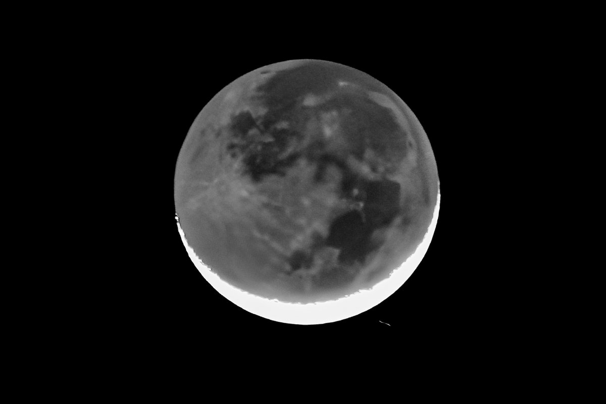 The moon in the shadows... A sliver of a moon visible ( setting in the west), here is the non visible part. (Bonus airplane in the lower right) <a href="/MattDevittWX/">Matt Devitt</a>